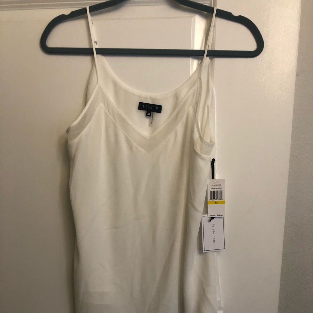 1.State tank with pretty sheer trim at top